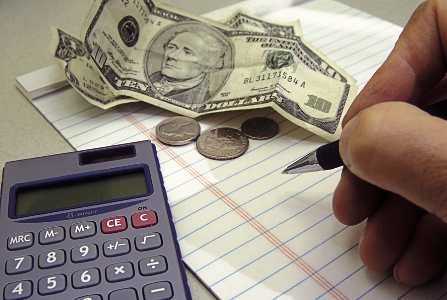 bigstockphoto_budgeting_your_money_615138